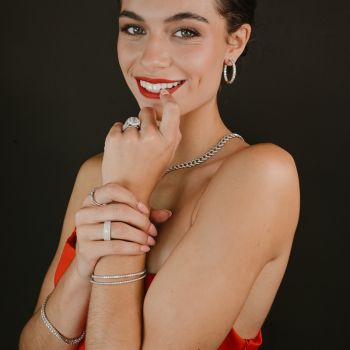 Woman in a red dress smiling